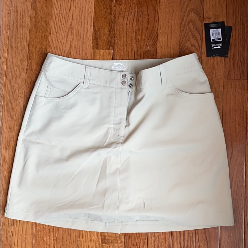 💛NWT tan sports skirts with pockets